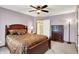 Comfortable bedroom features a wood bedframe, warm lighting, and a matching dresser at 195 Lake Dr, Greenwood, IN 46142