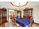 Elegant dining room featuring hardwood floors, a chandelier, and ample space for Gathering gatherings at 195 Lake Dr, Greenwood, IN 46142