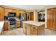 Bright kitchen with stainless steel appliances and center island at 195 Lake Dr, Greenwood, IN 46142