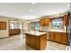 Spacious kitchen with island and eat-in area, connected to Gathering room at 195 Lake Dr, Greenwood, IN 46142