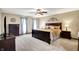 Spacious main bedroom with large bed, decorative headboard, and lots of natural light at 195 Lake Dr, Greenwood, IN 46142