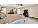 Bright main bedroom with neutral colors, a TV and lots of closet space at 195 Lake Dr, Greenwood, IN 46142