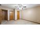 Bedroom showcasing neutral walls and ceiling fan at 2557 Cedarcrest Dr, Columbus, IN 47203