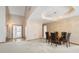 Bright dining area with chandelier and view of tiled entryway and front door at 2557 Cedarcrest Dr, Columbus, IN 47203
