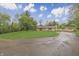 A brick home on a large lot, featuring an attached garage with driveway at 3008 Old State Road 37, Greenwood, IN 46143