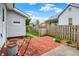 Scenic backyard with brick pathway and a tidy lawn at 301 Colescott St, Shelbyville, IN 46176