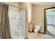 Bathroom featuring white shower enclosure and a toilet at 301 Colescott St, Shelbyville, IN 46176