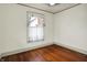 Bedroom with hardwood floors, a window, and natural light at 301 Colescott St, Shelbyville, IN 46176
