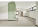 Large bedroom showing interesting architectural details, neutral carpet, and walk in closet at 301 Colescott St, Shelbyville, IN 46176