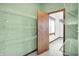 Walk-in closet with wire shelving, open door to bedroom, and an adjacent window at 301 Colescott St, Shelbyville, IN 46176