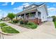 Corner lot featuring a well-manicured lawn, detached garage, and convenient driveway at 301 Colescott St, Shelbyville, IN 46176