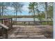 Spacious wooden deck with lake views, great for enjoying the outdoors and waterfront living at 3136 River Bay N Dr, Indianapolis, IN 46240