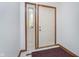Entryway features a decorative glass side light and neutral tile at 3136 River Bay N Dr, Indianapolis, IN 46240