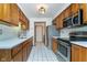 Well-lit kitchen featuring stainless steel appliances, white subway tiles and updated countertops at 3136 River Bay N Dr, Indianapolis, IN 46240