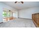 Open living space leads to sunroom with large windows at 3136 River Bay N Dr, Indianapolis, IN 46240