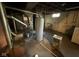 Unfinished basement area showing utilities including furnace and water heater at 324 E Southern Ave, Indianapolis, IN 46225
