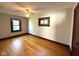 Spacious bedroom with two windows, ceiling fan and lots of natural light at 324 E Southern Ave, Indianapolis, IN 46225