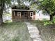 Charming brick bungalow with covered porch and original details at 324 E Southern Ave, Indianapolis, IN 46225