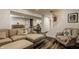 Comfortable finished basement with stylish seating, a ping pong table, and sports decor at 4134 N Pennsylvania St, Indianapolis, IN 46205