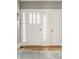 Bright entryway with classic doors and beautiful hardwood floors at 4134 N Pennsylvania St, Indianapolis, IN 46205