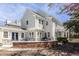 Stately home with a brick-lined patio, outdoor seating, and beautifully manicured landscaping at 4134 N Pennsylvania St, Indianapolis, IN 46205