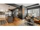 Open-concept living area, seamlessly connecting the kitchen, dining, and sitting areas at 4134 N Pennsylvania St, Indianapolis, IN 46205