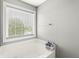 Bright soaking tub featuring natural light from the window at 4264 Amesbury Pl, Noblesville, IN 46062