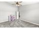 The bedroom is spacious with neutral tones and lots of room to play at 4264 Amesbury Pl, Noblesville, IN 46062