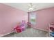 Cute pink bedroom featuring bright natural light from the window at 4264 Amesbury Pl, Noblesville, IN 46062