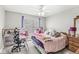 Cozy bedroom with a ceiling fan and natural light from a window at 4264 Amesbury Pl, Noblesville, IN 46062