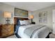This well-designed bedroom features a modern design, a large window, and stylish furnishings for ultimate comfort at 4542 Laughter Ln, Indianapolis, IN 46235