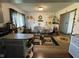 Dining area featuring wood-look flooring, sewing machine and an abundance of decorative wall hangings at 4711 Earlham Dr, Indianapolis, IN 46227