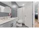 Bathroom featuring a shower, toilet, and vanity at 5168 E Walnut Dr, Mooresville, IN 46158