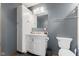 Bathroom featuring gray walls, toilet, vanity with marble counter top, and chrome finishes at 5168 E Walnut Dr, Mooresville, IN 46158
