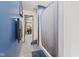 Hallway view into a stylish bathroom with updated fixtures and a shower at 5168 E Walnut Dr, Mooresville, IN 46158