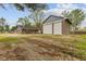 Exterior view of home with brick, siding, large yard, and attached garage at 5168 E Walnut Dr, Mooresville, IN 46158