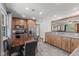 A kitchen and dining area featuring granite countertops and stainless steel appliances, and stylish decor at 5168 E Walnut Dr, Mooresville, IN 46158