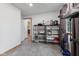 Functional pantry space equipped with shelving for storage and a bright window at 5168 E Walnut Dr, Mooresville, IN 46158