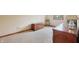 Bedroom with light colored carpet, a chest, and a vintage chair at 524 Deerberry Dr, Noblesville, IN 46062