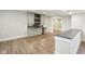Finished basement area featuring a kitchenette with cabinetry, sink, and countertop at 579 Exmoor Dr, Carmel, IN 46032