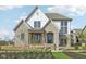 Beautiful two story home exhibits a brick facade and modern architectural details at 579 Exmoor Dr, Carmel, IN 46032