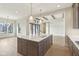 Spacious kitchen featuring a large island, ample cabinetry, and natural light at 579 Exmoor Dr, Carmel, IN 46032