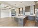 Gourmet kitchen with island, custom cabinets, and modern fixtures at 579 Exmoor Dr, Carmel, IN 46032