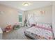 Playful bedroom with canopy bed, window views and room to play at 5876 E 126Th St, Carmel, IN 46033
