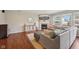 Inviting living room with a cozy fireplace, mounted TV, and comfortable sectional sofa at 5876 E 126Th St, Carmel, IN 46033