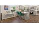 Bright kitchen with gray cabinets, granite countertops, an island with seating, and modern appliances at 601 Ridgeview Ln, Columbus, IN 47201