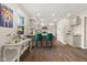 Open kitchen design with granite countertops, a kitchen island with seating, and modern light-gray cabinets at 601 Ridgeview Ln, Columbus, IN 47201