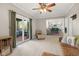 Cozy living room with sliding doors to the patio, comfortable seating, and an open view of the kitchen at 601 Ridgeview Ln, Columbus, IN 47201