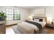 Bright bedroom featuring a window view, neutral colors, and stylish decor at 6140 King Lear Ln, Indianapolis, IN 46254