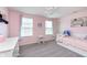 Bright bedroom with carpet, complemented by a small white vanity table and white furniture at 6164 Brighton Dr, Whitestown, IN 46075